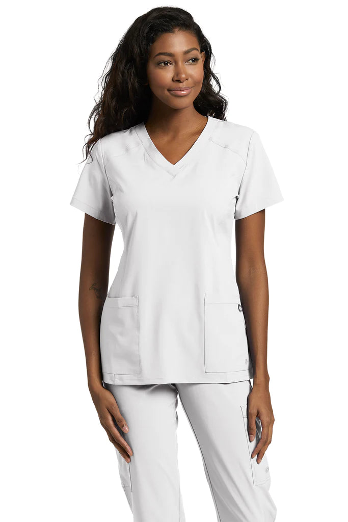 Haut d'uniforme White Cross pour femme Fit col en V #785